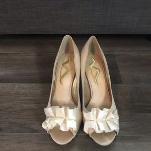 Nina peep-toe pumps